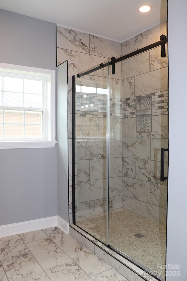 418 Huntington Woods St SE, Lenoir, NC 28645 - bathroom with a shower stall, marble look tiles, and recessed lighting