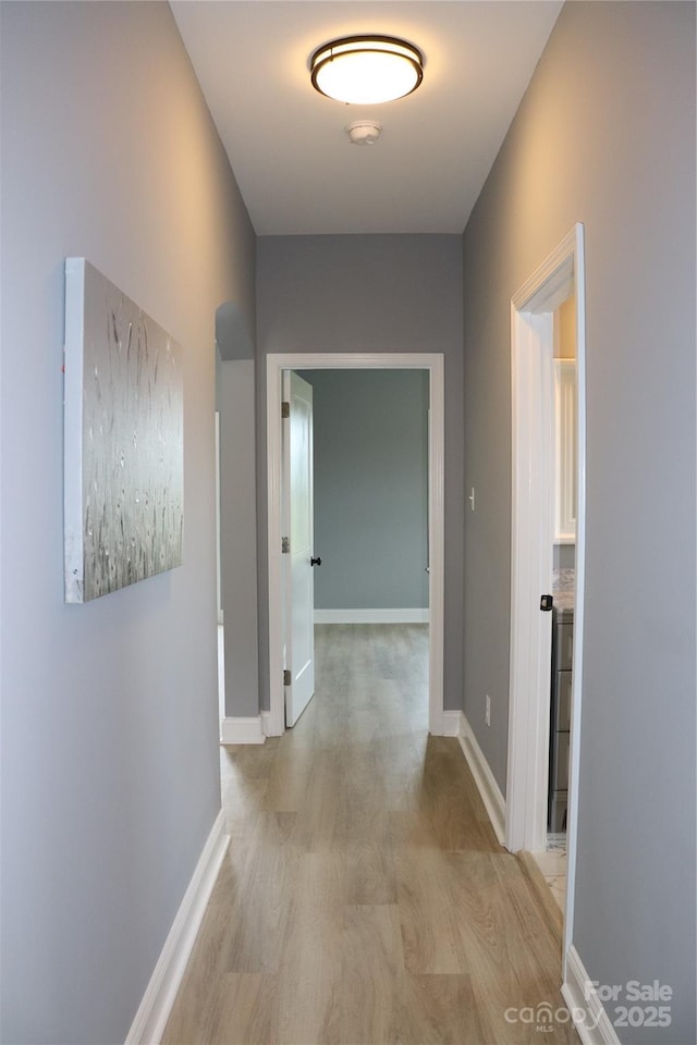 418 Huntington Woods St SE, Lenoir, NC 28645 - hall with light wood-type flooring and baseboards