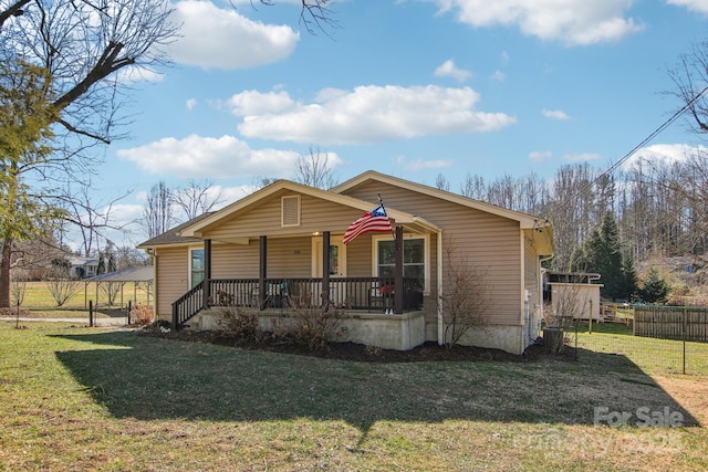 view of front of house with a front lawn and a porch