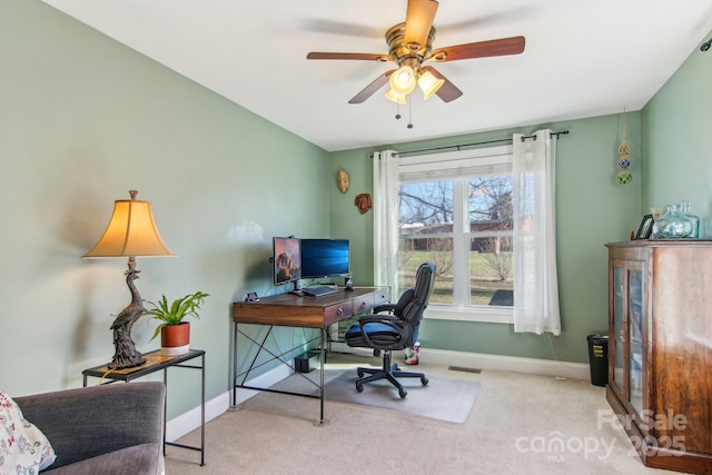 office area featuring ceiling fan and light colored carpet