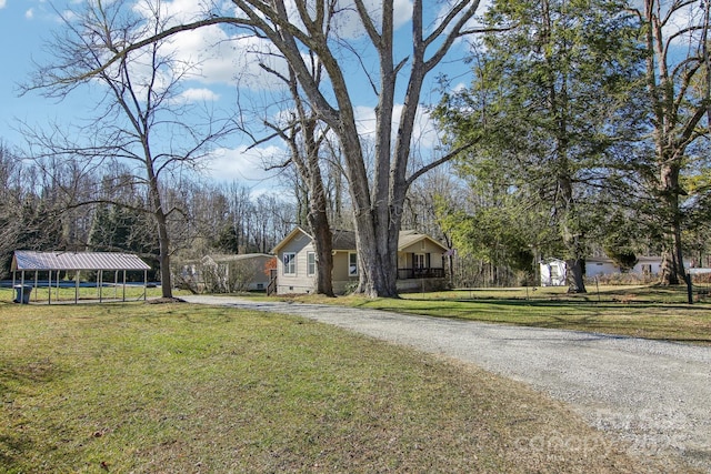 view of yard featuring a carport