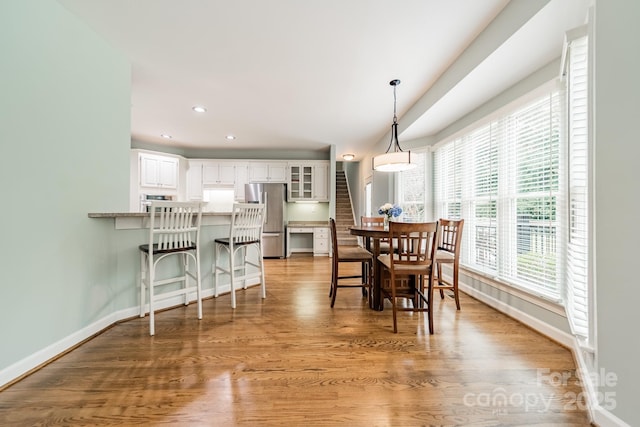 dining area featuring hardwood / wood-style flooring