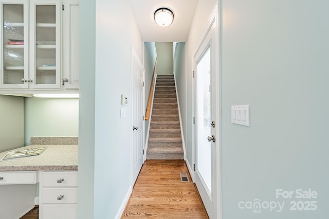 interior space with hardwood / wood-style floors