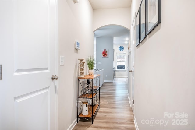 hall featuring light wood-type flooring