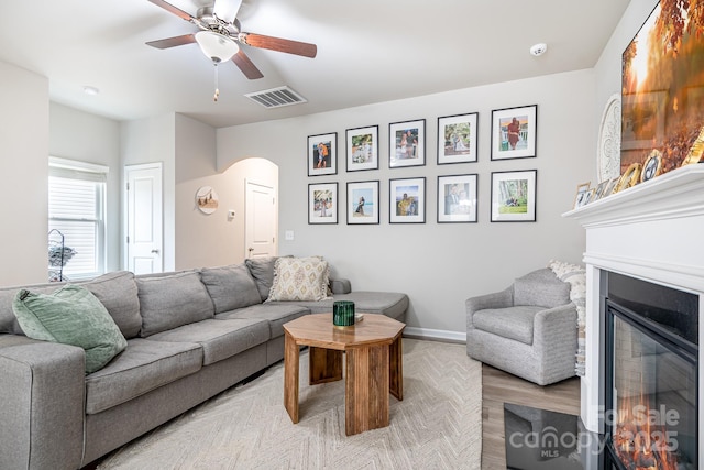 living room with ceiling fan