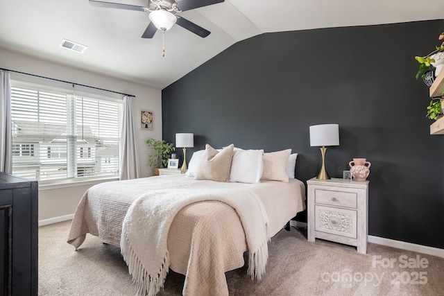 carpeted bedroom with lofted ceiling and ceiling fan