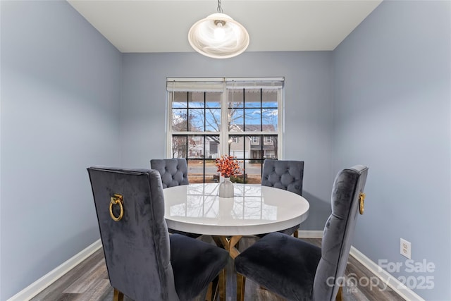 dining room featuring dark hardwood / wood-style floors