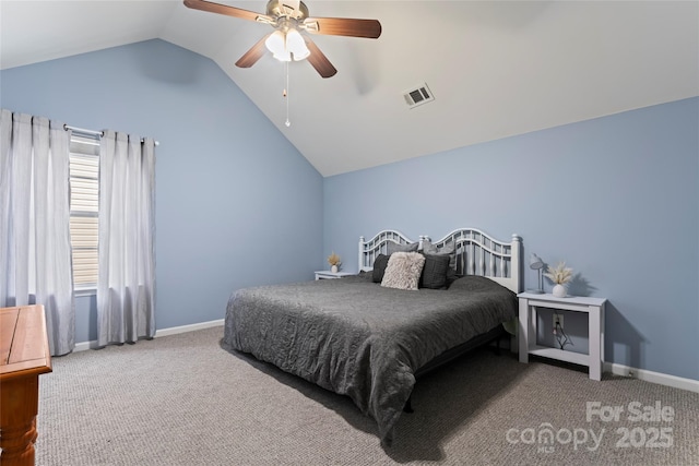 carpeted bedroom with ceiling fan and vaulted ceiling