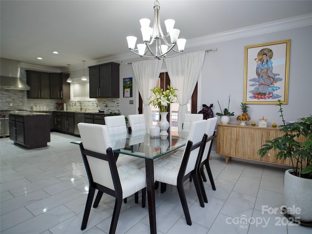 dining room featuring sink, radiator, ornamental molding, and a chandelier