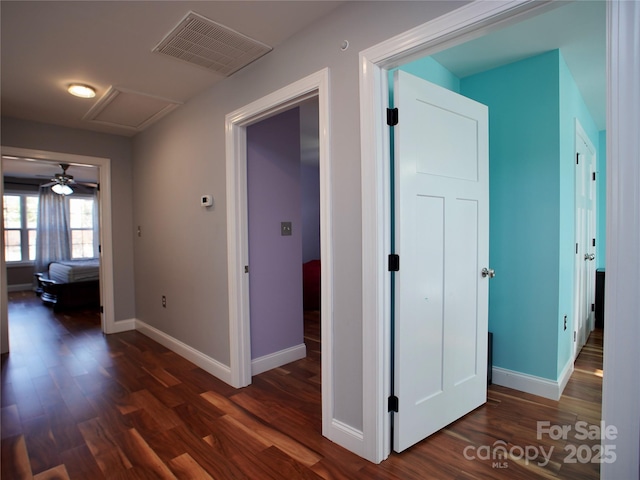 hallway featuring dark wood-type flooring