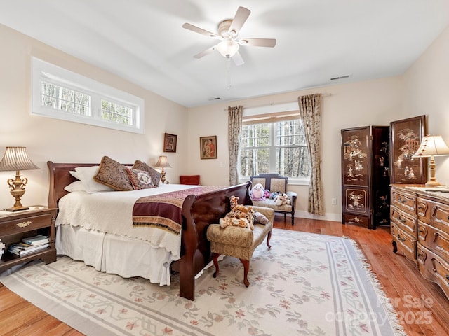 bedroom featuring ceiling fan and light hardwood / wood-style floors