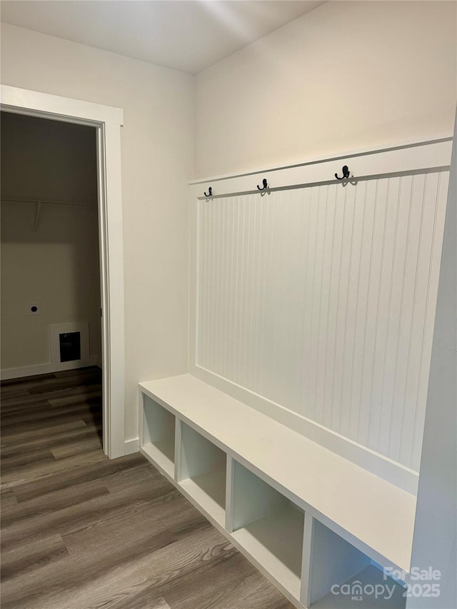 mudroom with dark wood-style floors