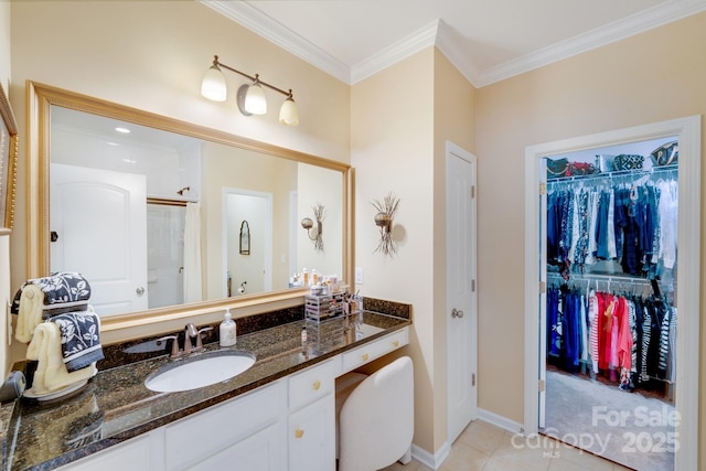 bathroom with crown molding, vanity, tile patterned floors, and a shower with shower door