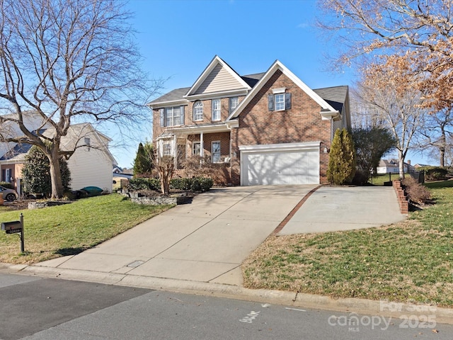 view of front of house featuring a garage, a front yard, and covered porch