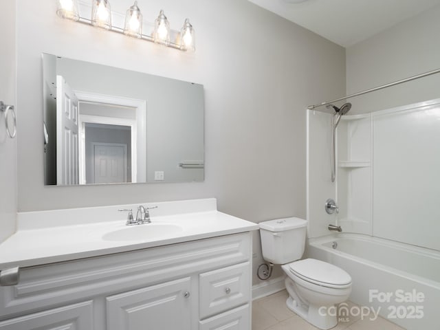 full bathroom featuring bathing tub / shower combination, vanity, tile patterned floors, and toilet