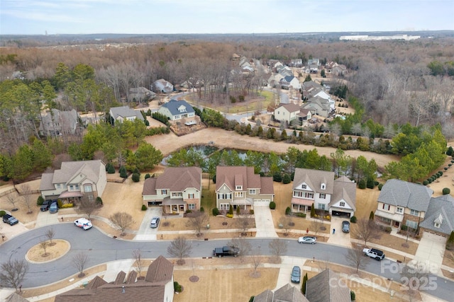 birds eye view of property with a residential view