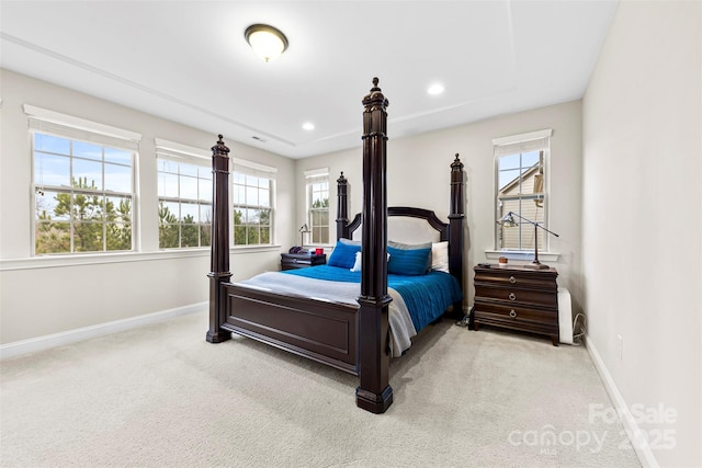 bedroom with carpet, multiple windows, baseboards, and recessed lighting