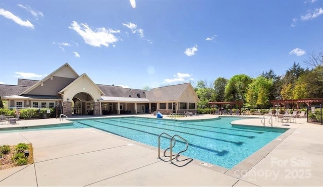 pool featuring a patio
