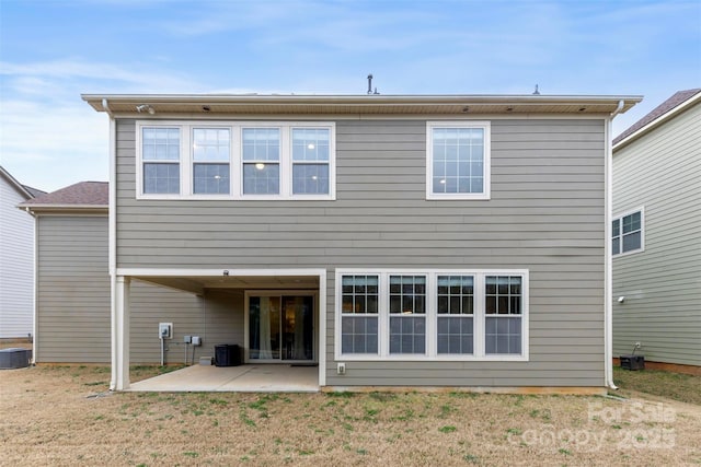 back of property featuring central AC and a patio