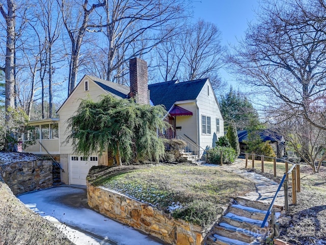 view of home's exterior featuring a garage