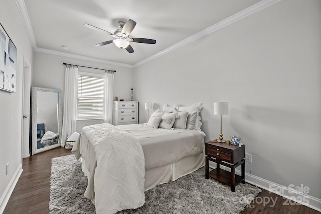 bedroom featuring ceiling fan, dark hardwood / wood-style flooring, and crown molding