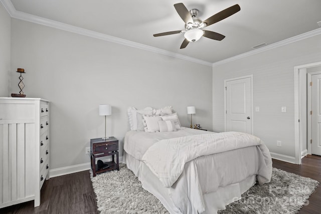 bedroom with ceiling fan, dark wood-type flooring, and crown molding