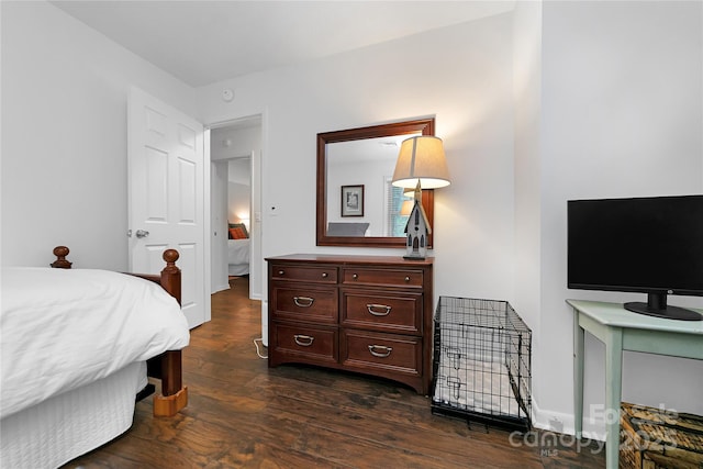 bedroom featuring dark hardwood / wood-style floors