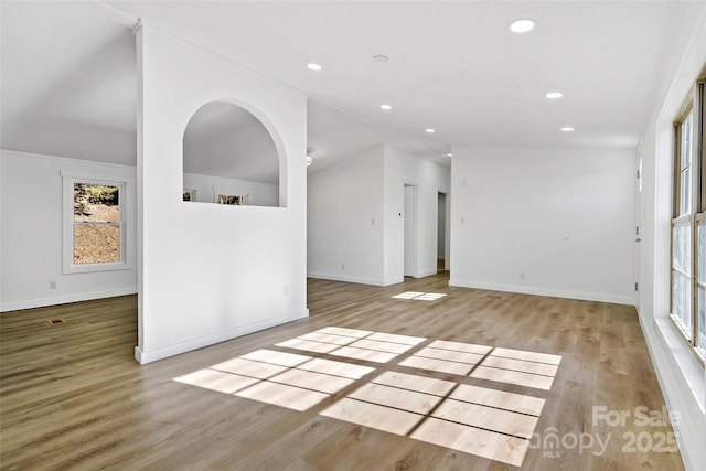 spare room featuring light hardwood / wood-style floors