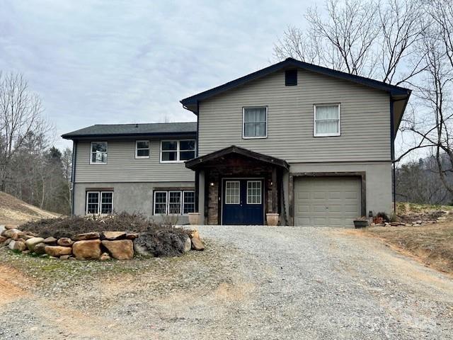 view of front of property featuring a garage