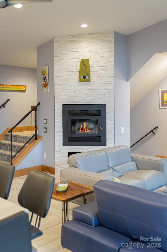 living room featuring a fireplace