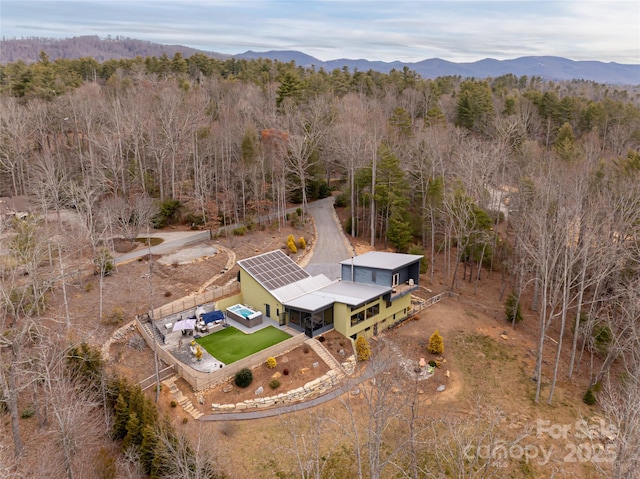 bird's eye view with a mountain view