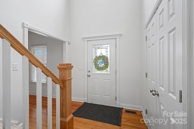 foyer with hardwood / wood-style floors