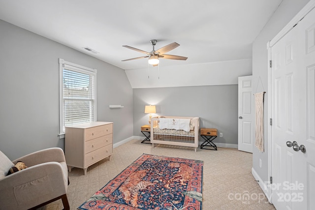 bedroom with vaulted ceiling and ceiling fan