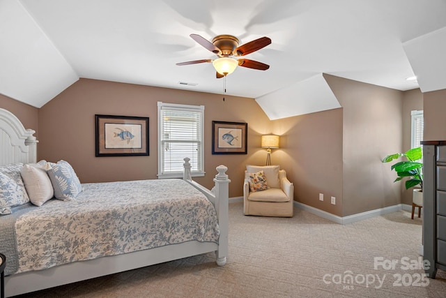 bedroom with ceiling fan, lofted ceiling, and light colored carpet