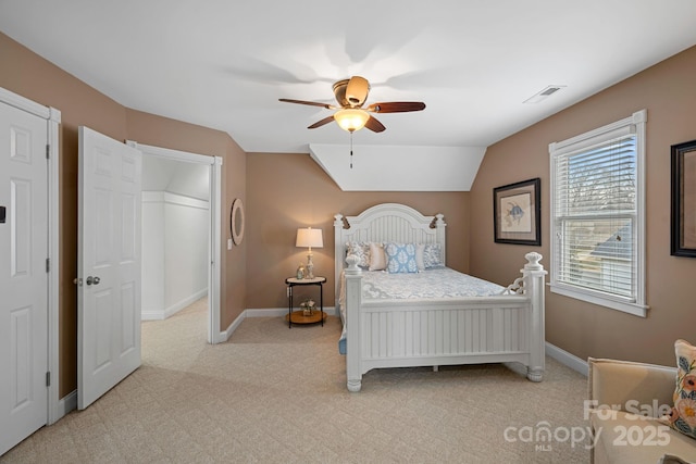 bedroom featuring light carpet, ceiling fan, and lofted ceiling