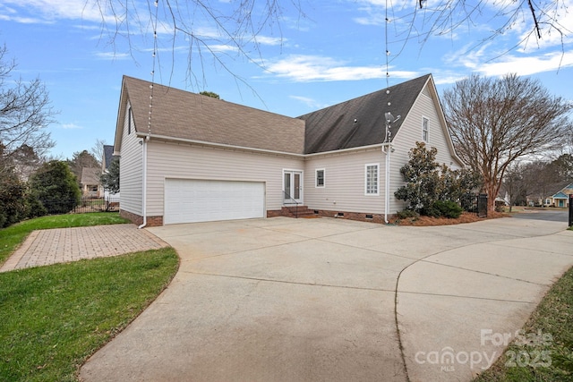 view of property exterior featuring a garage