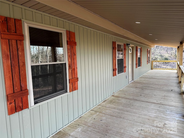 wooden terrace with covered porch