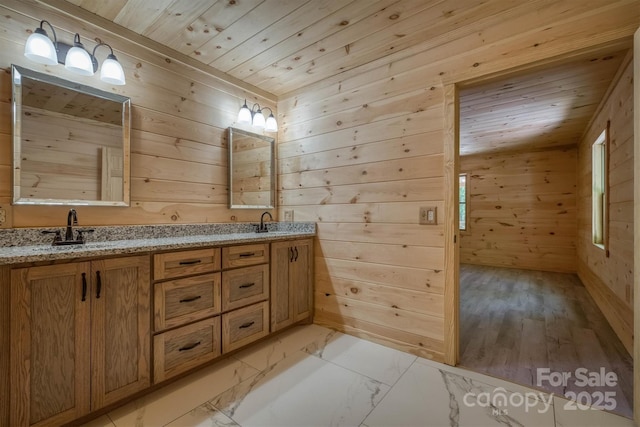 3161 Morganton Furniture Rd, Valdese, NC 28690 - bathroom featuring double vanity, a sink, wood ceiling, and wooden walls