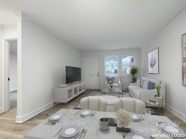 living room featuring hardwood / wood-style floors and crown molding