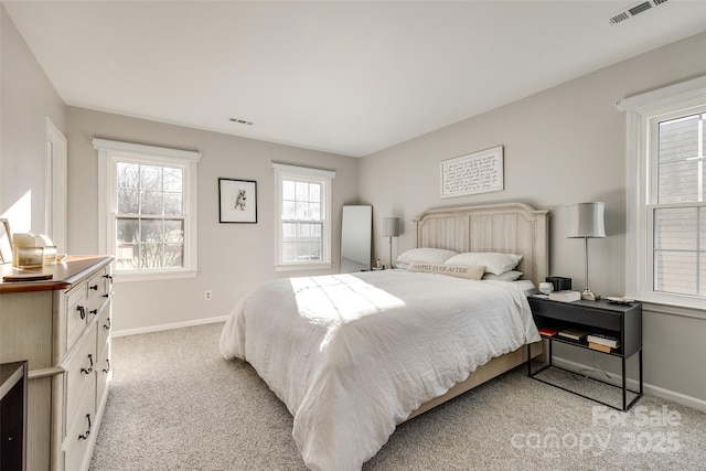 bedroom with light carpet