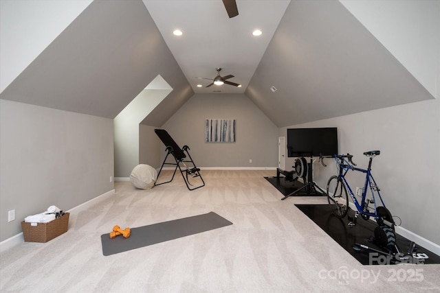 exercise room featuring lofted ceiling, carpet floors, and ceiling fan