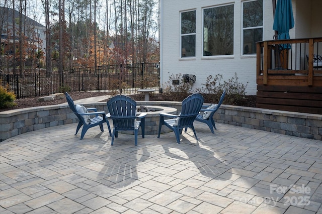 view of patio / terrace with a fire pit