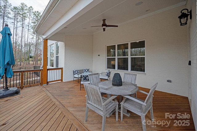 wooden terrace with ceiling fan