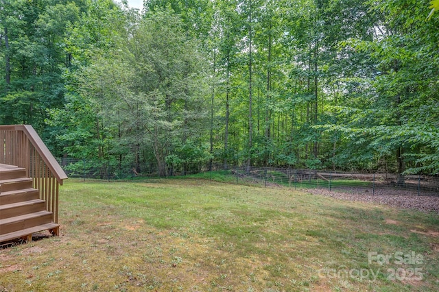 view of yard featuring a deck