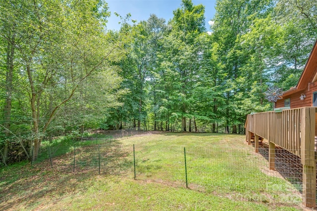 view of yard with a deck