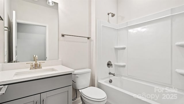 full bathroom with toilet, vanity, and shower / bathtub combination