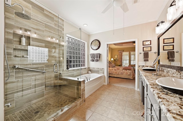 bathroom with independent shower and bath, crown molding, tile patterned floors, vanity, and ceiling fan