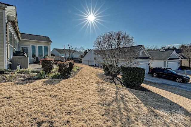 view of yard with a garage