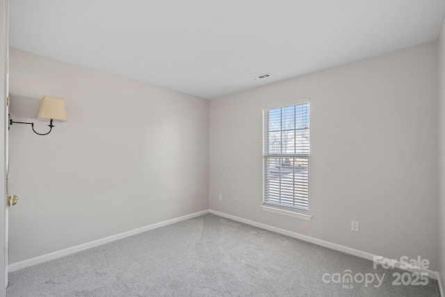 empty room featuring carpet