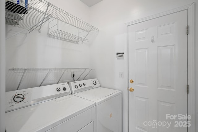 laundry area featuring independent washer and dryer